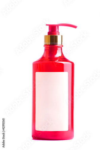red plastic bottle of liquid soap