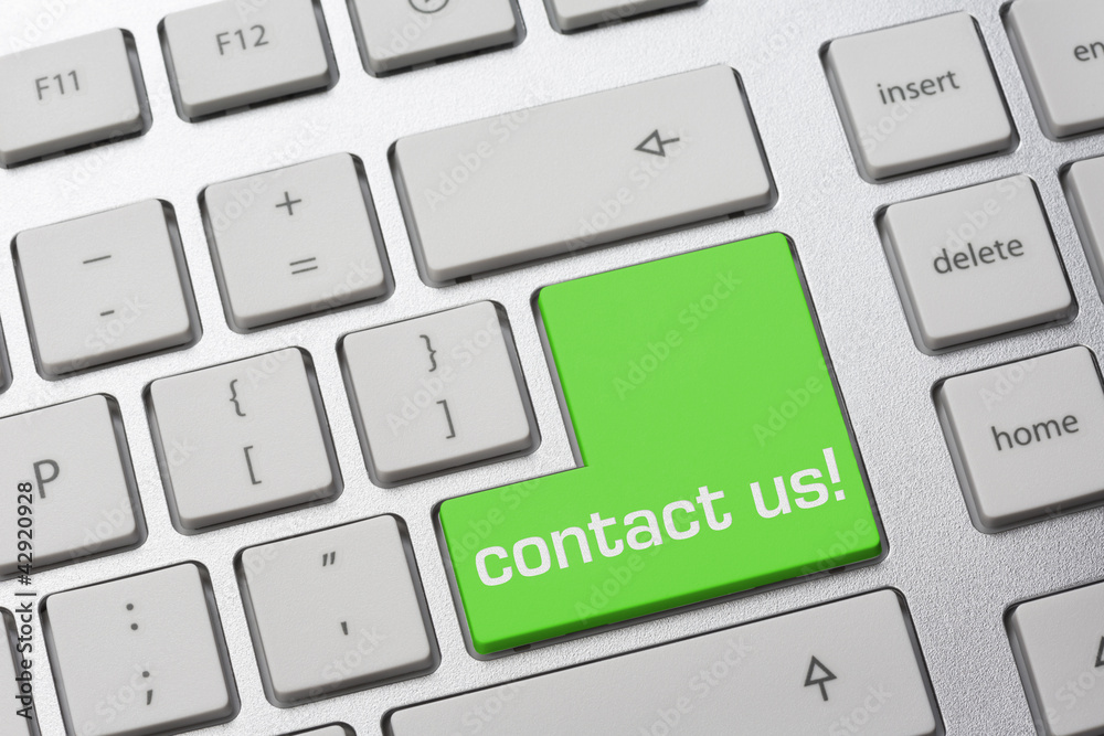 grüne Taste auf Tastatur: contact us! grüne Taste auf Tastatur: contact us!