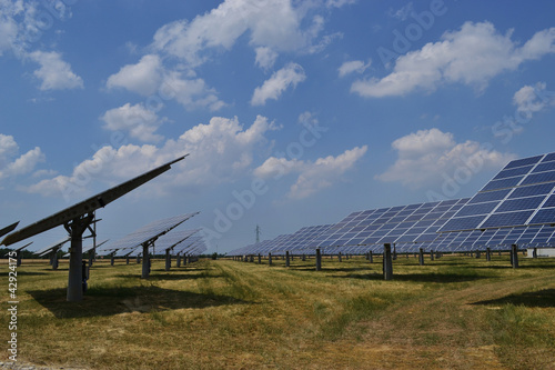 Solar panels on green grass