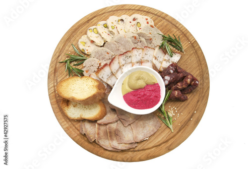 тарелка с колбасой photo