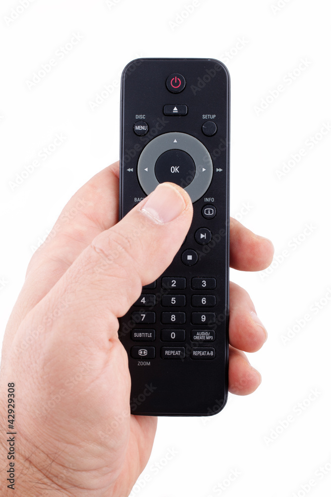 Hand holding TV remote control Hand holding TV remote control
