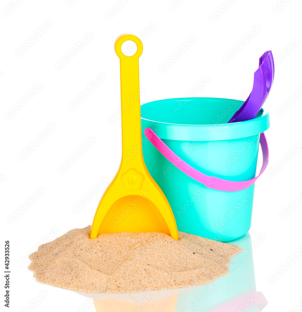 Children's beach toys and sand isolated on white Children's beach toys and sand isolated on white