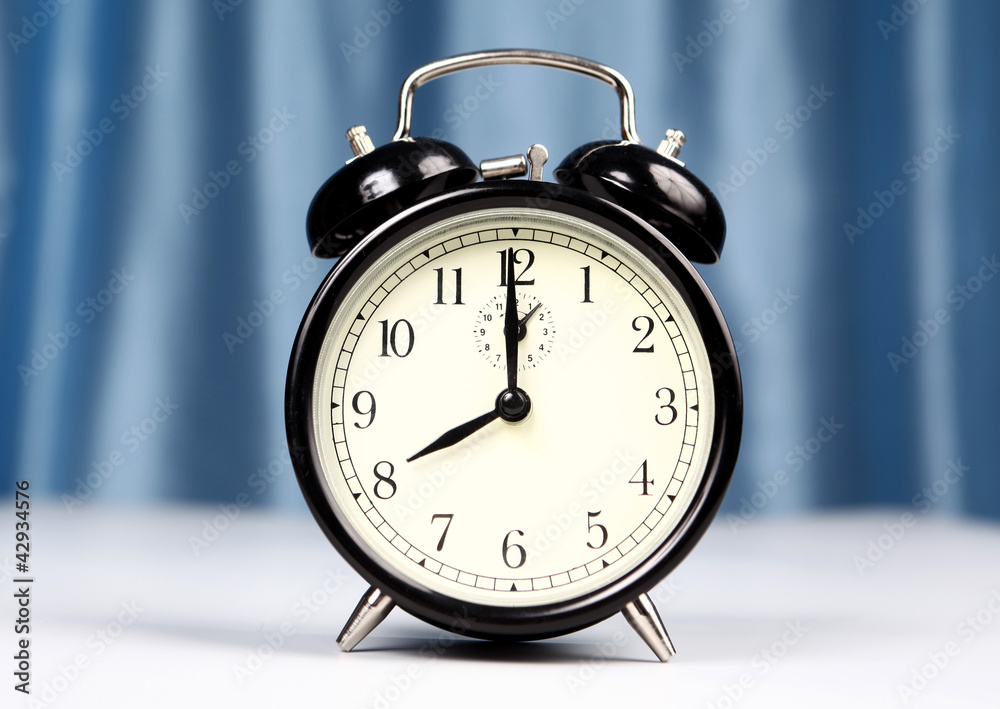 Alarm clock on a light background Alarm clock on a light background