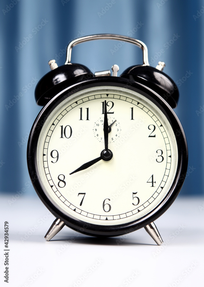 Alarm clock on a light background Alarm clock on a light background