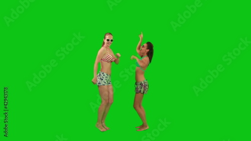 Summer girls in bra and shorts dancing barefoot