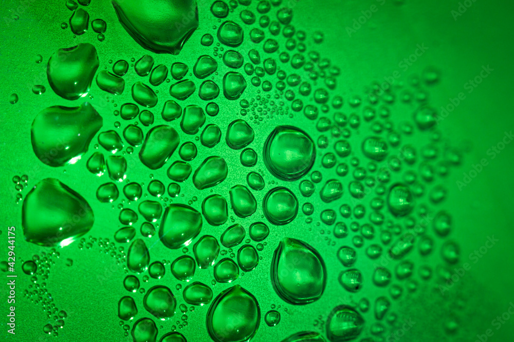 Refreshing green watery background (color toned image; shallow D