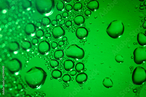 Refreshing green watery background (color toned image; shallow D