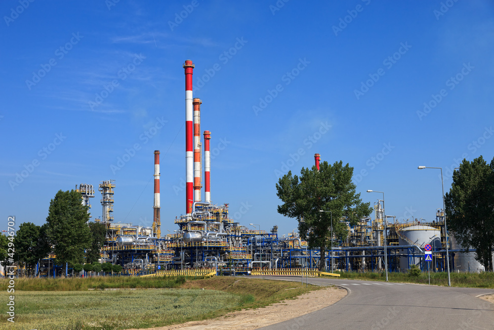 Oil-refinery, industrial-plant under blue sky.