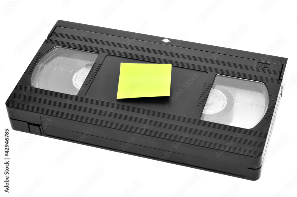 videotape with blank sticky note