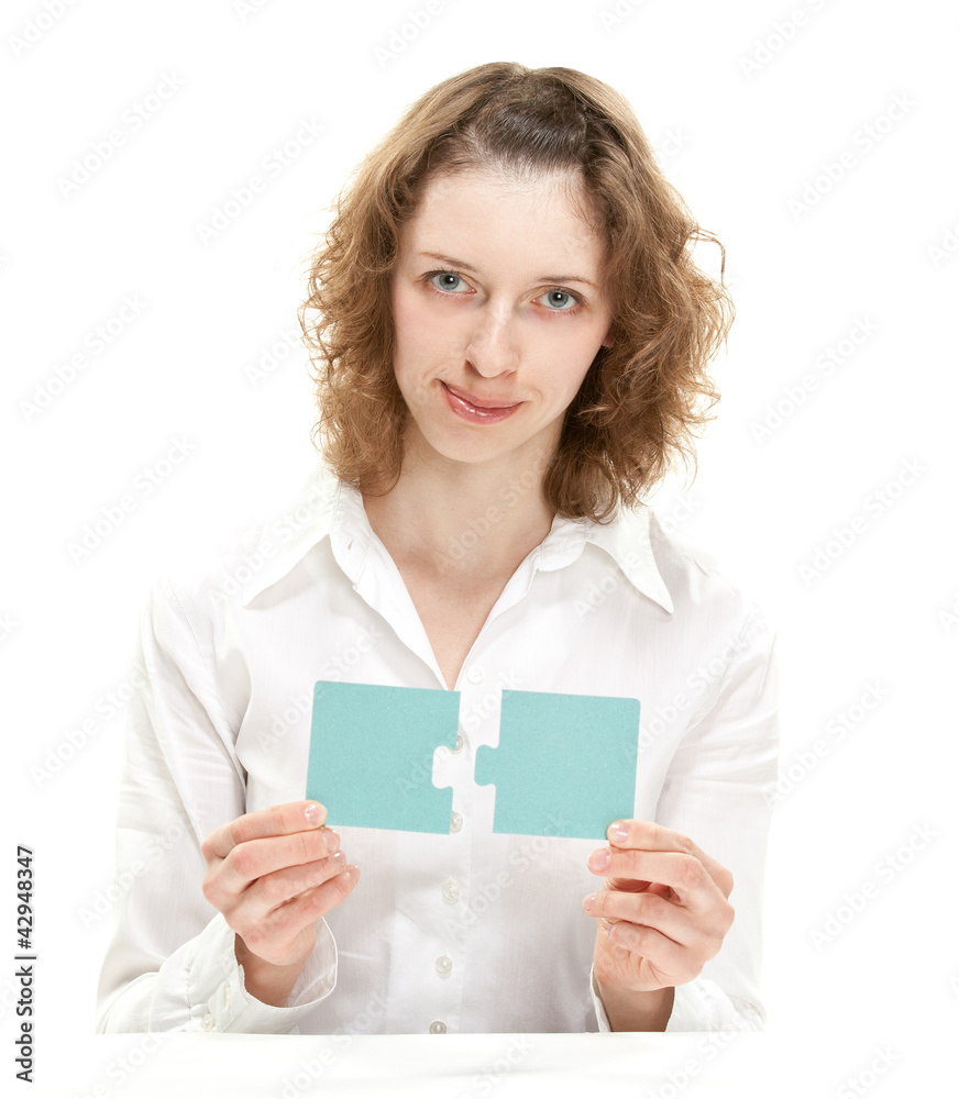 Attractive young woman showing blank puzzles Attractive young woman showing blank puzzles