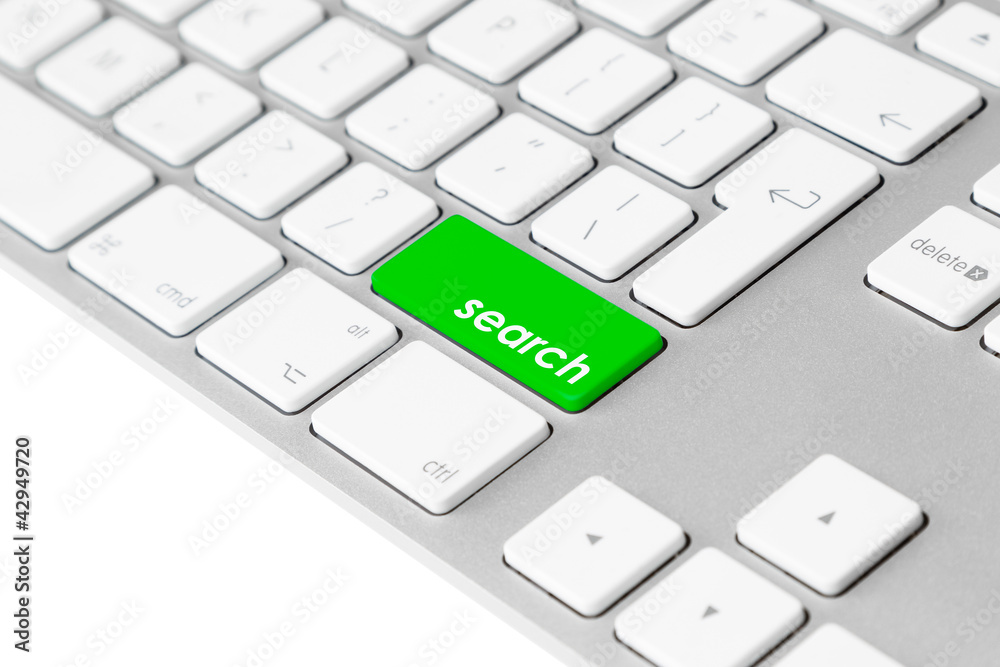 Computer keyboard with green “search” button Computer keyboard with green “search” button