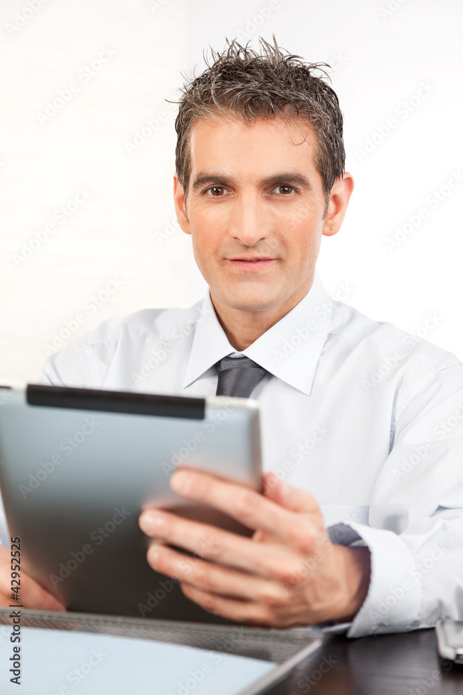 Businessman Holding Digital Tablet Businessman Holding Digital Tablet