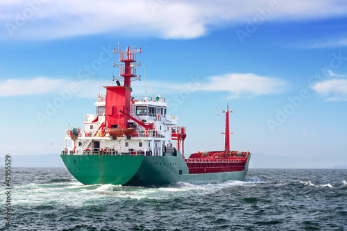 Tanker ship sailing into the open sea