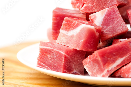 pieces of frozen meat isolated