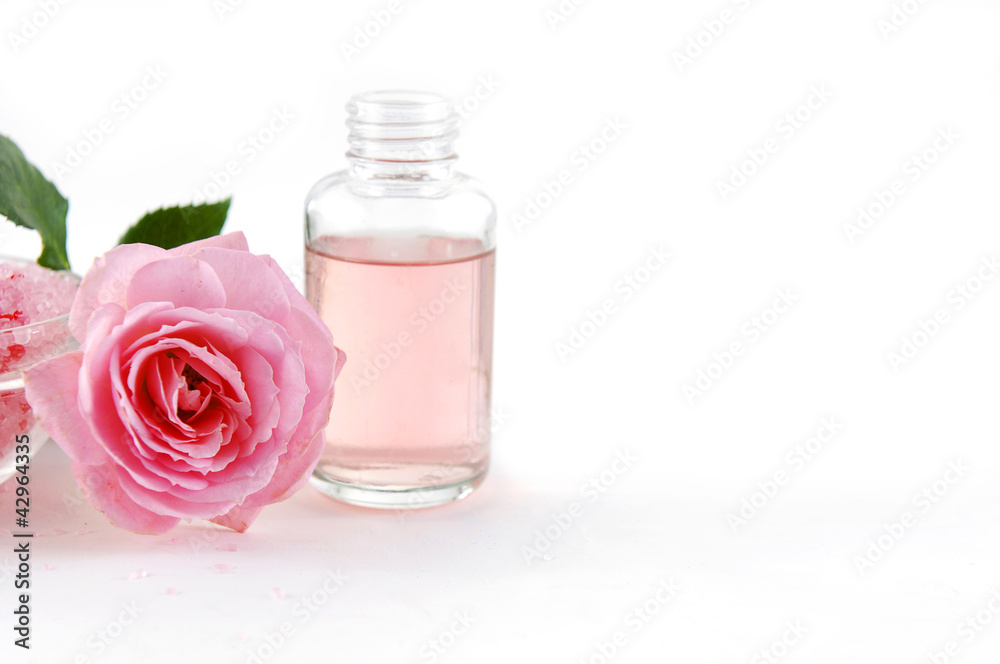 moisturizer bottles and roses. Pink spa still life moisturizer bottles and roses. Pink spa still life
