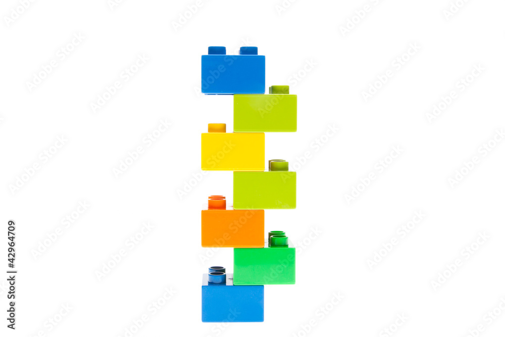 Plastic building blocks on white background Plastic building blocks on white background