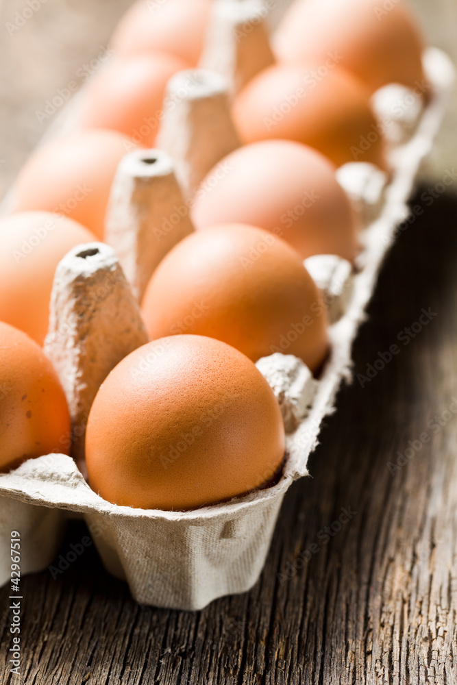 brown eggs in egg box brown eggs in egg box