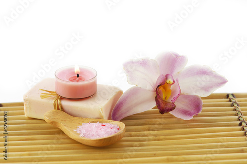 Spa resort-orchid  candle on soap  salt in spoon