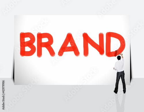 Business man paint business word on white background