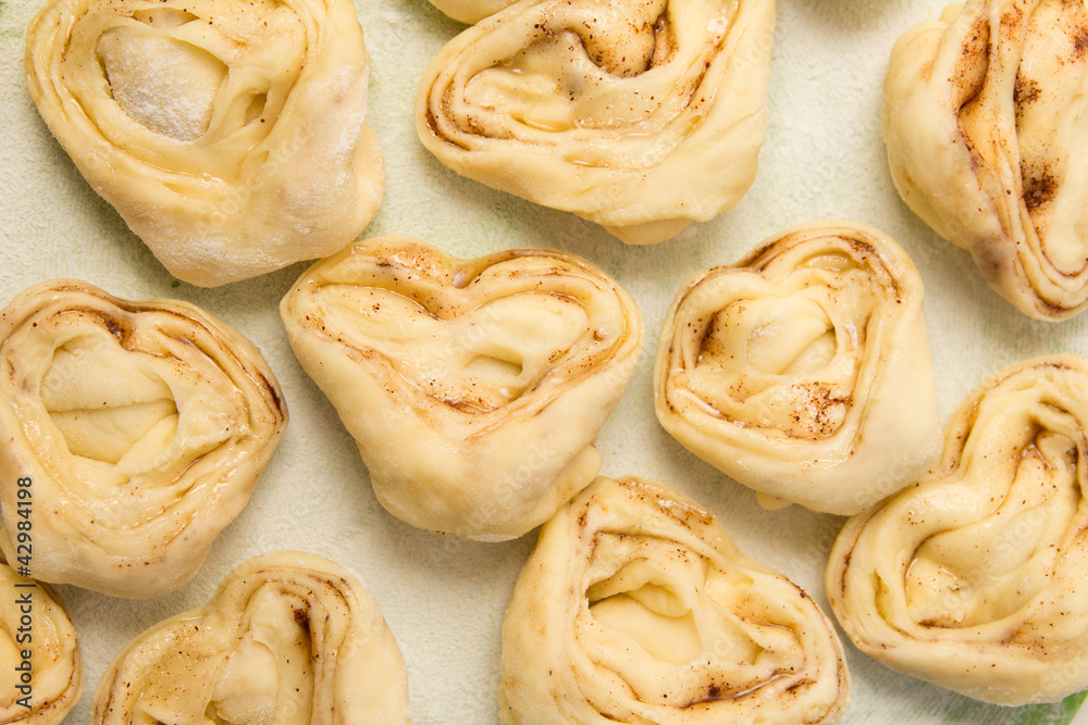Half-finished product of a roll with cinnamon Half-finished product of a roll with cinnamon