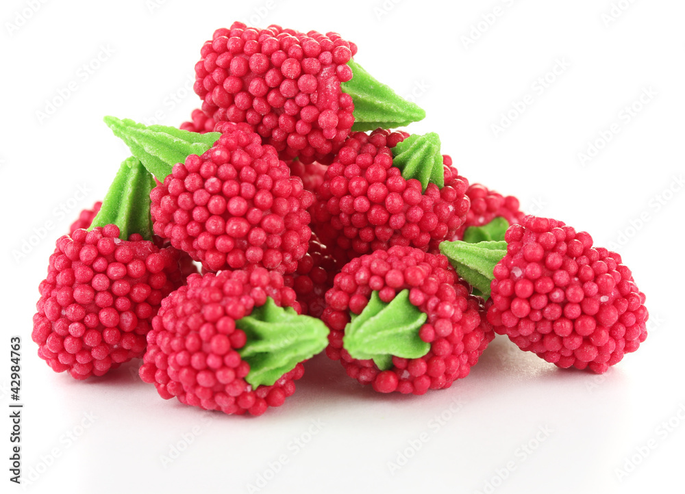 red candy raspberries isolated on white red candy raspberries isolated on white