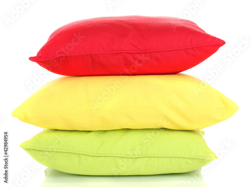 Bright color pillows isolated on white