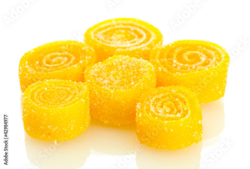 yellow jelly candies isolated on white.