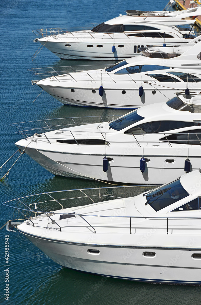 Fototapeta premium White motor yacht over harbor pier, Odessa, Ukraine