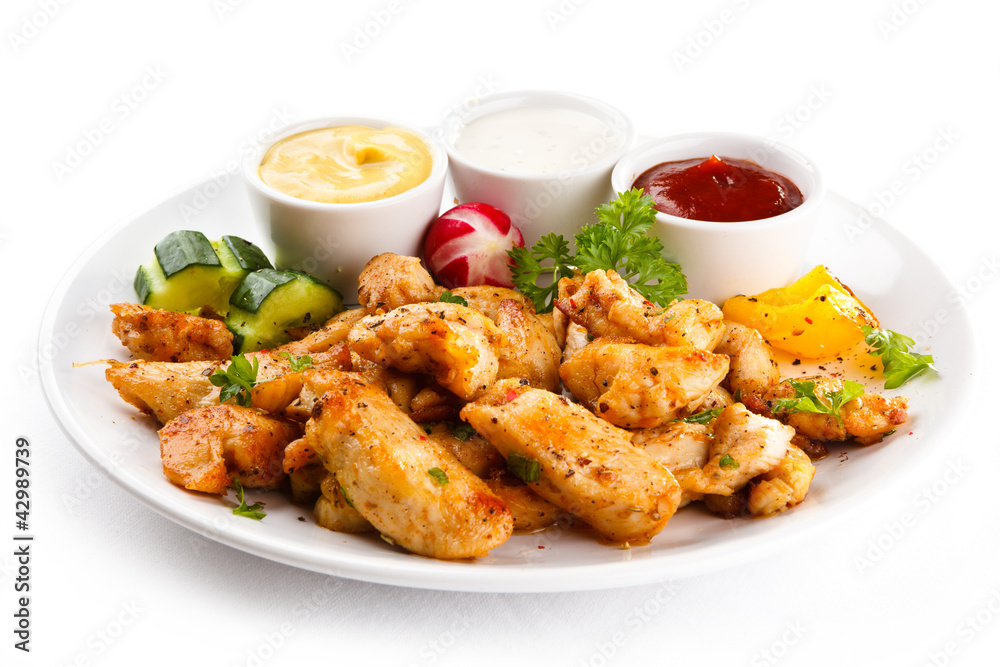 Grilled meat and vegetables on white background Grilled meat and vegetables on white background