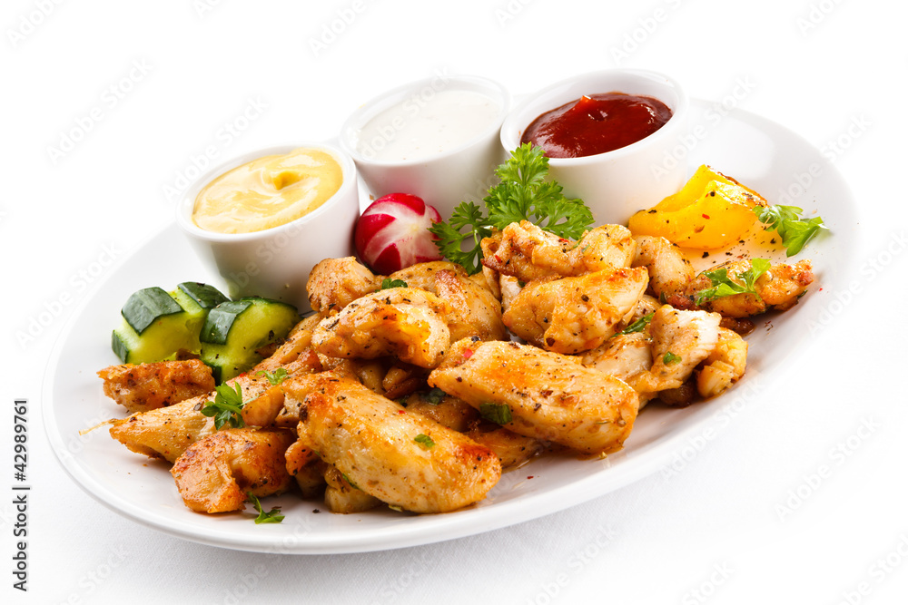 Grilled meat and vegetables on white background Grilled meat and vegetables on white background