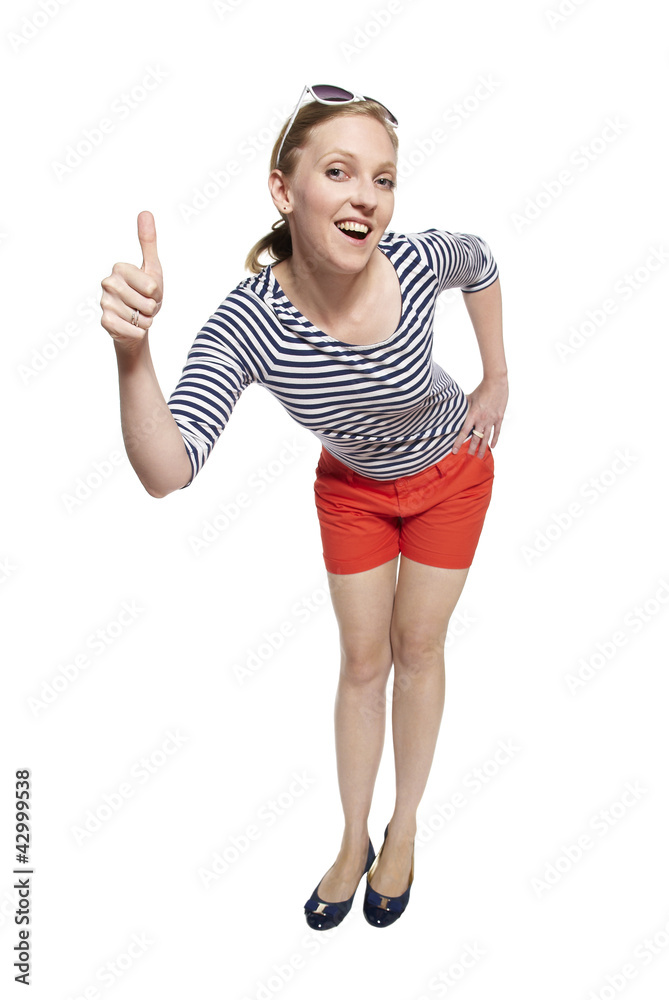 Portrait of a young woman showing thumbs up Portrait of a young woman showing thumbs up