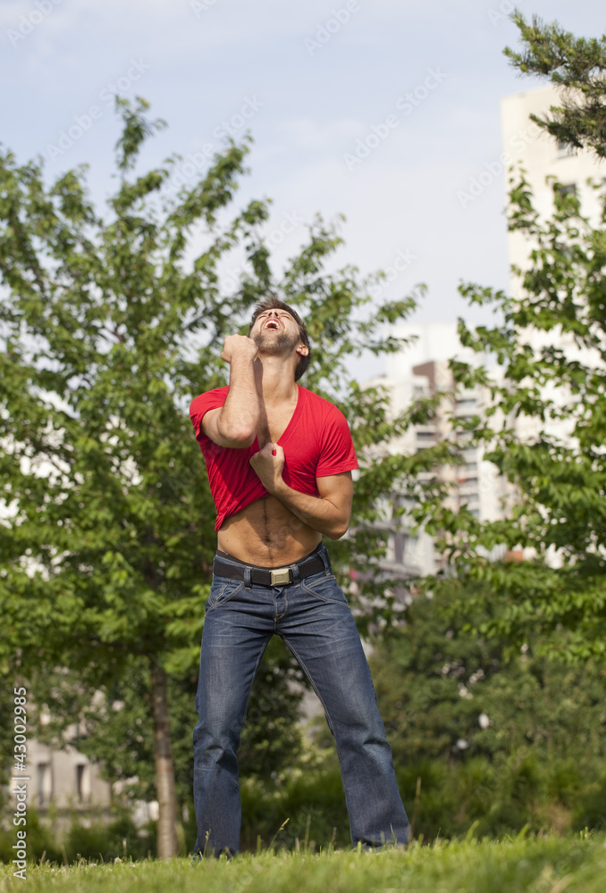 sexy man expressing his joy and strength sexy man expressing his joy and strength