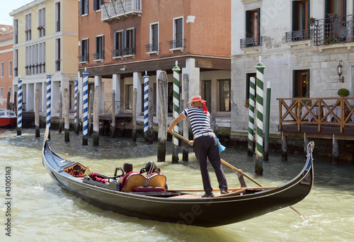 Tela Gondolier on the Grand Canal, Venice, Italy