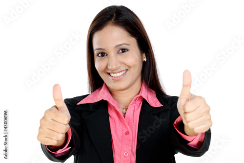 Business woman showing thumbs up