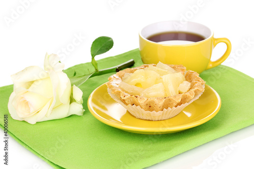 sweet cake with cup of tea isolated on white