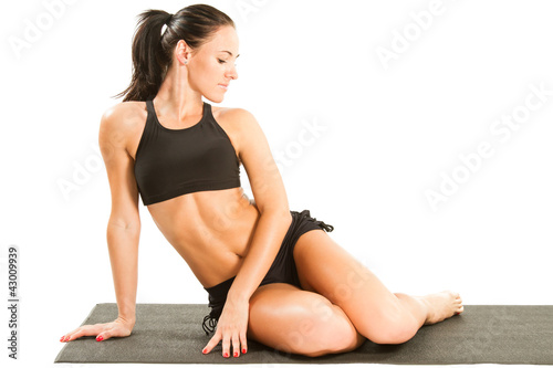 Sexy yoga female doing yogatic exericise photo