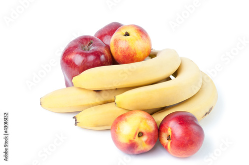 Bananas, apples and nectarines, isolated on white