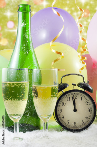 Happy new year with clock and champagne