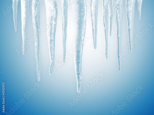 Icicles on blue background
