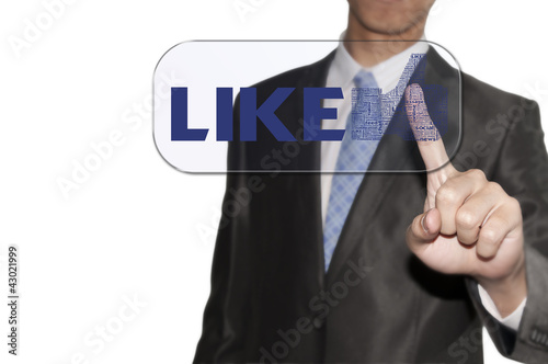 Business man touching the LIKE button