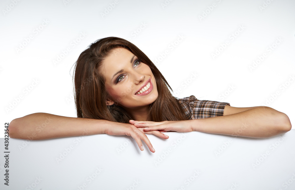 Happy smiling beautiful young woman showing blank signboard, is Happy smiling beautiful young woman showing blank signboard, is