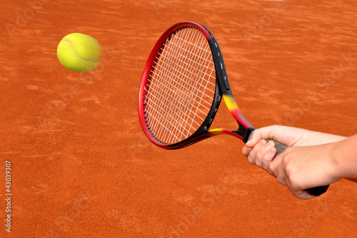 tennis racket and the ball © vencav