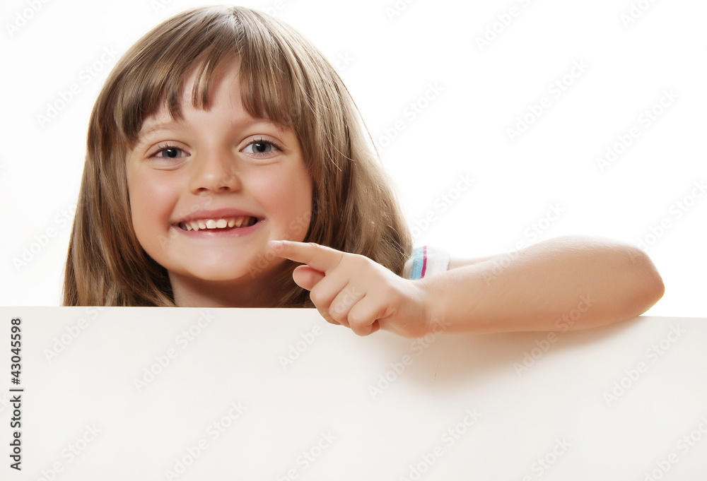 happy little girl holding white board with empty space happy little girl holding white board with empty space
