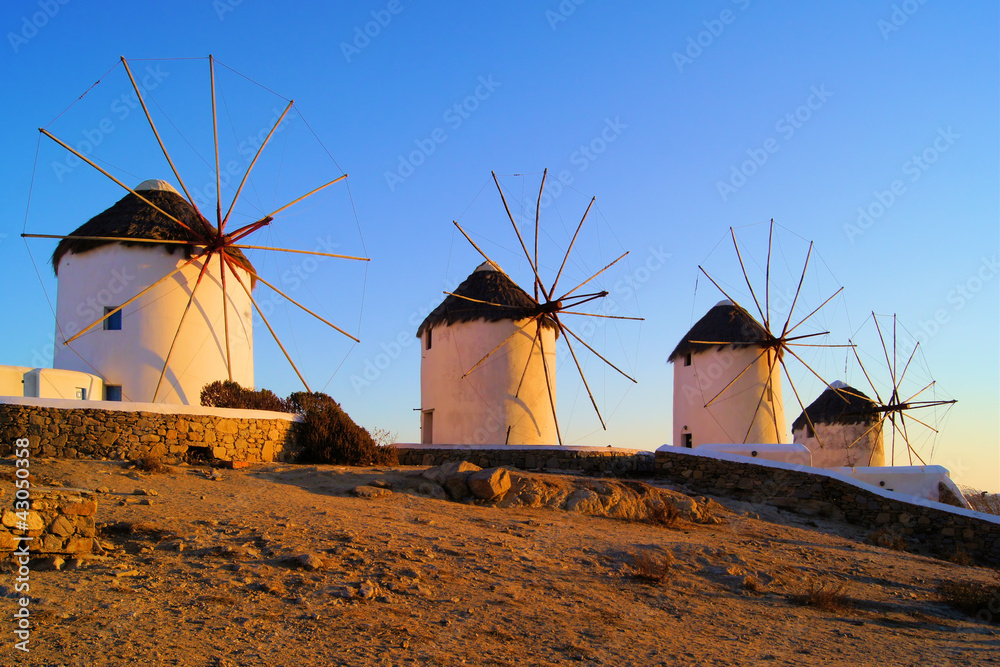 Traditional Greek windmills at sunset, Mykonos, Greece