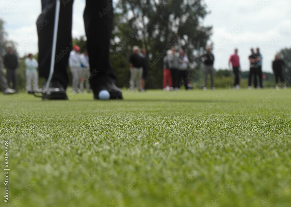 Obraz premium golfeur sur un green