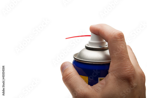 hand pushing spray can. isolated over white background