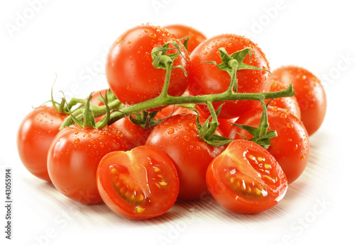 Fresh raw tomatoes isolated on white