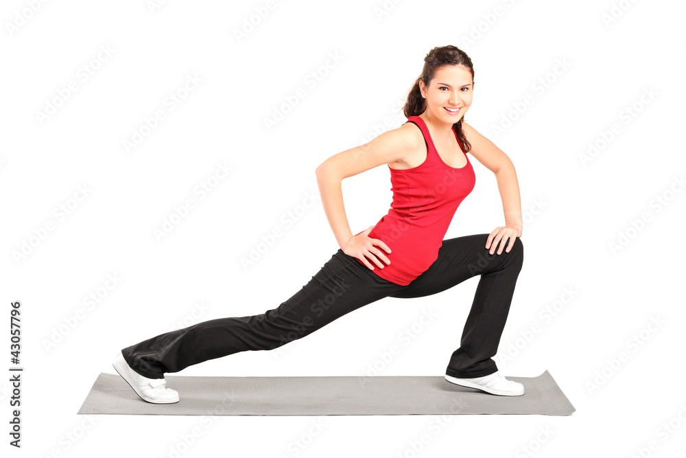 A young athlete practicing pilates A young athlete practicing pilates