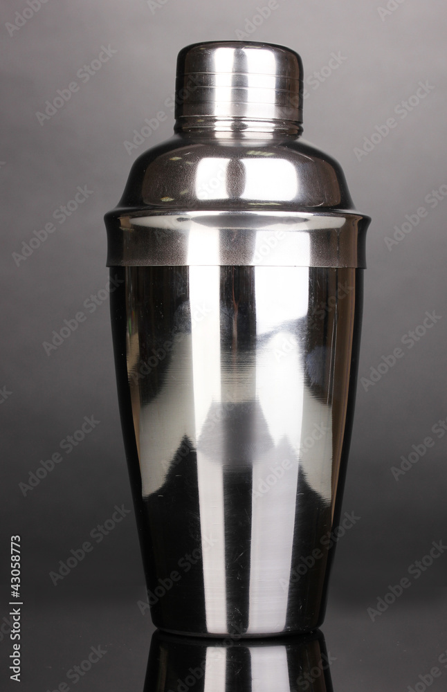 Cocktail shaker on grey background Cocktail shaker on grey background