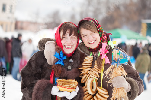 girls with pancake during  Shrovetide